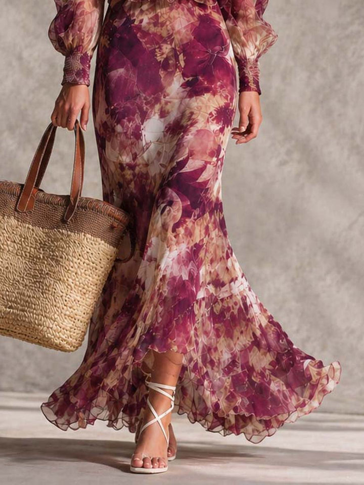 Abito lungo in chiffon rosa cipria con stampa floreale e spalle scoperte