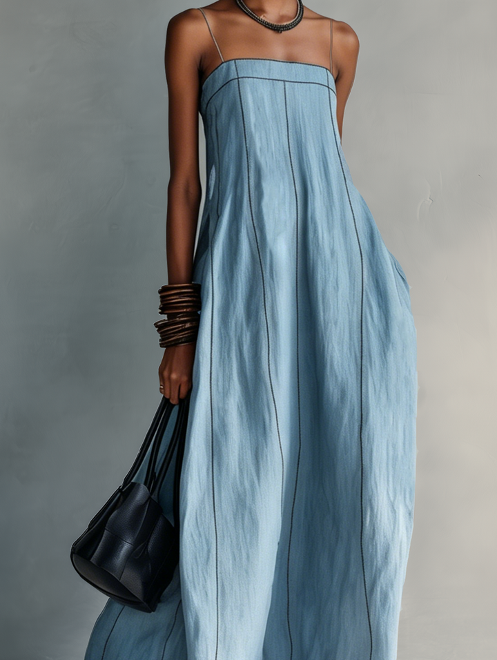 Camilla | Maxi abito azzurro smanicato dalla linea morbida