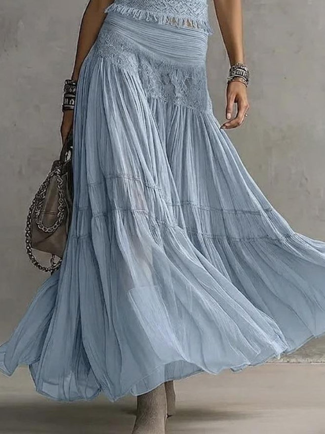 Renata | Completo azzurro con top traforato e gonna lunga plissettata