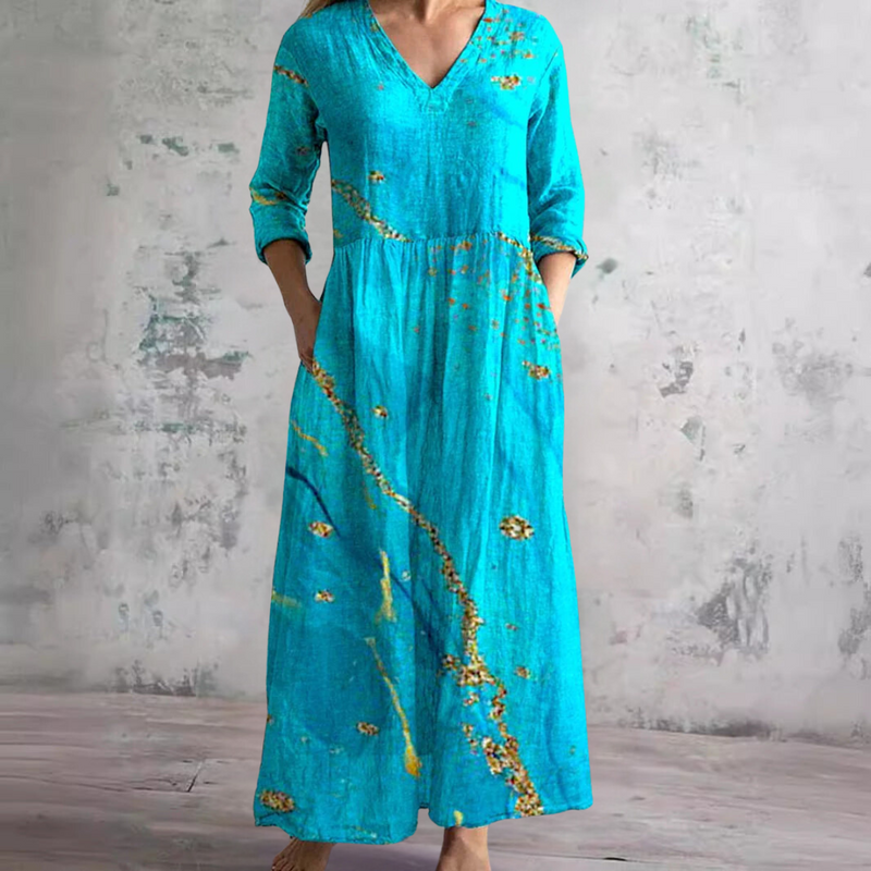 Turchesa | Abito maxi floreale turchese con silhouette fluida e scollo a V