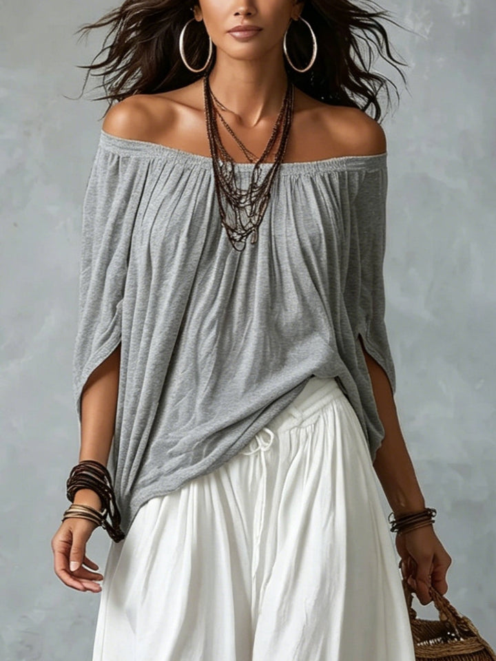 Ondina | Completo due pezzi con top off-shoulder grigio e pantaloni lanterna bianchi