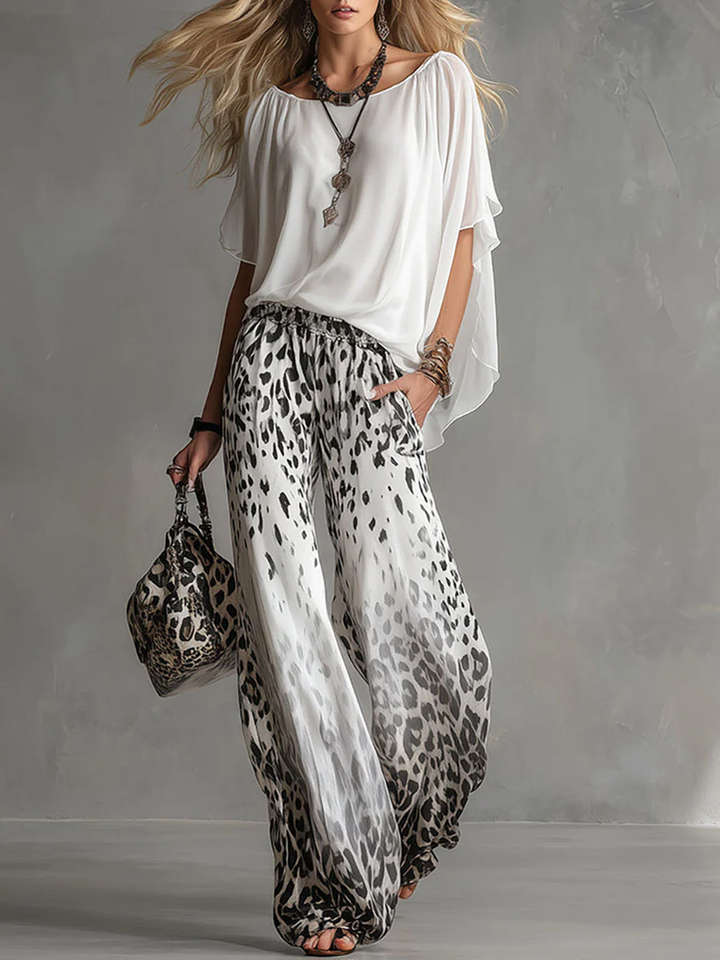Arabella | Completo con top a mantella e pantaloni leopardati a gamba larga
